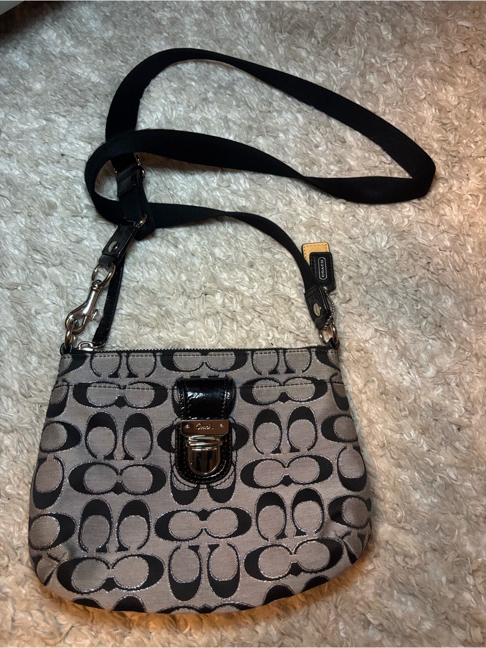 Vintage Coach signature monogram crossbody bag with a metallic finish